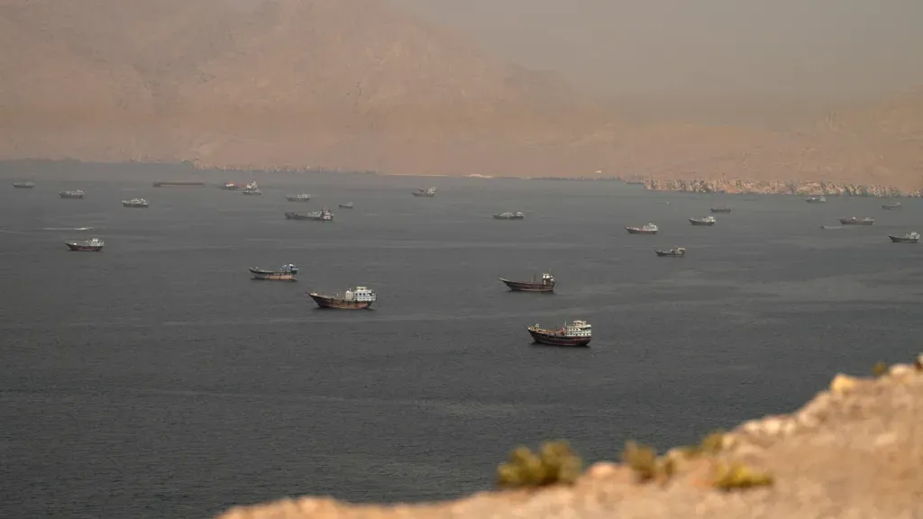 Iran says it controls Strait of Hormuz after Trump claims US has 'total control'