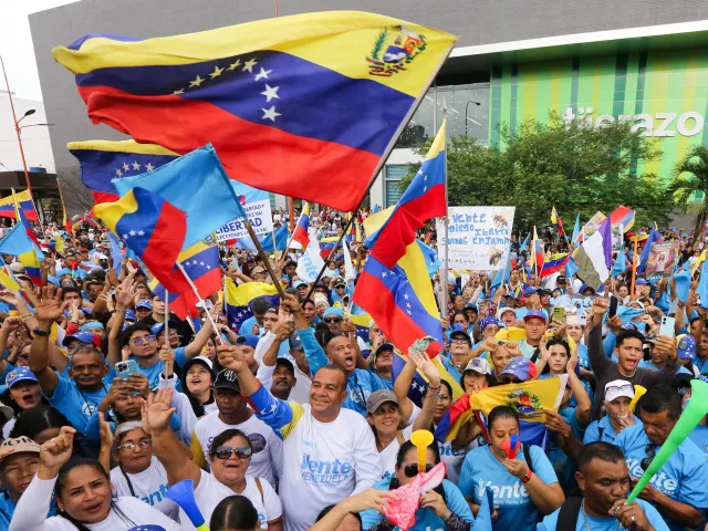 Venezuelans Take to Streets Demanding Free Elections as Successor to Maduro Remains Undecided
